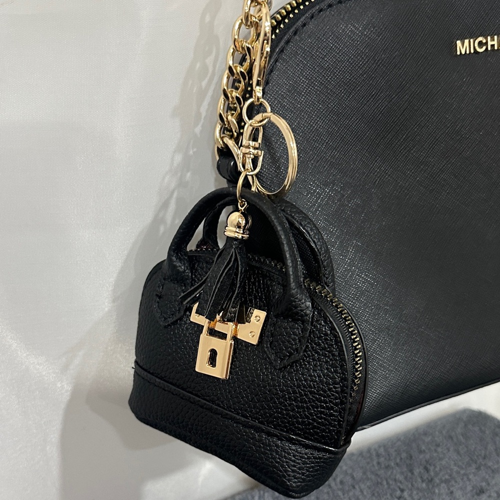 Black Mini Bag Charm with Gold Accents NWT 
Perfect size to use for bags